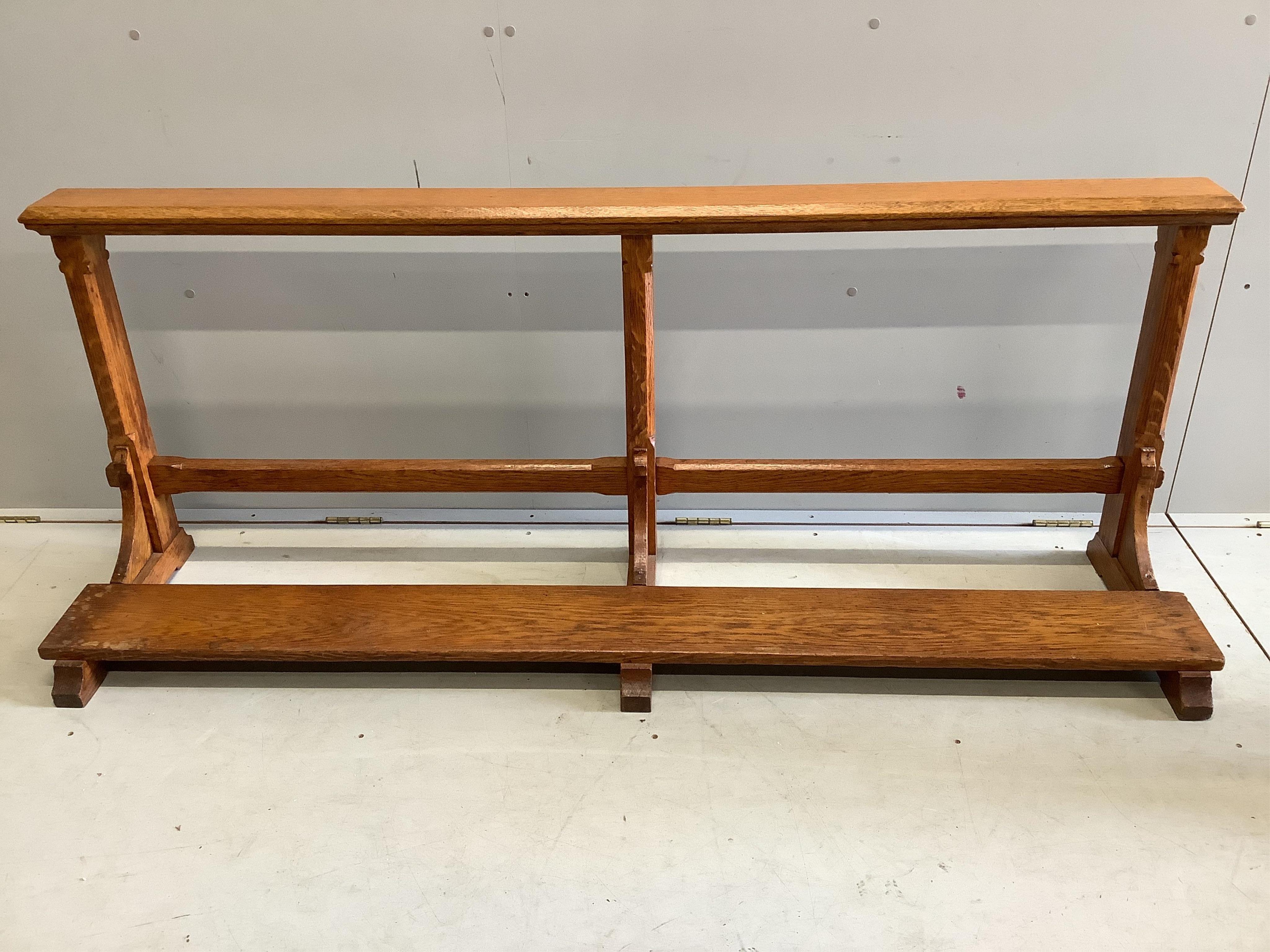 A pair of oak church rails, width 175cm, height 67cm. Condition - fair to good